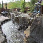 Creating a Waterfall at Your Backyard with the Help of Stonemakers